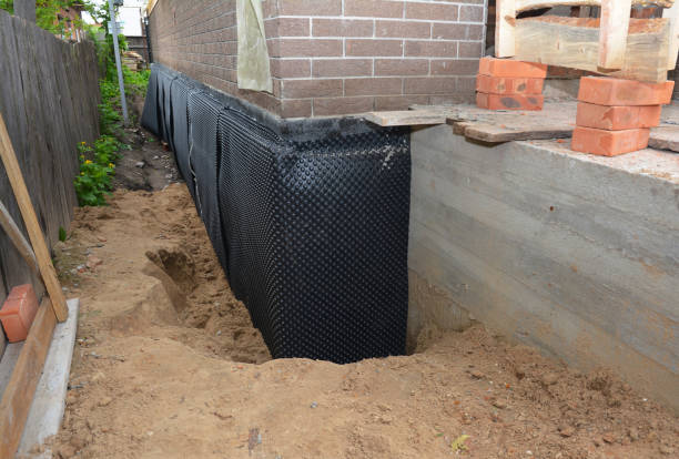 SJ Waterproofing Pros technician performing targeted Foundation Crack Repair assessment in Barnesville, GA